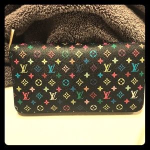 A multi color Zippy Louis Vuitton wallet Nior.